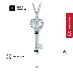 Lightly worn open heart key necklace.